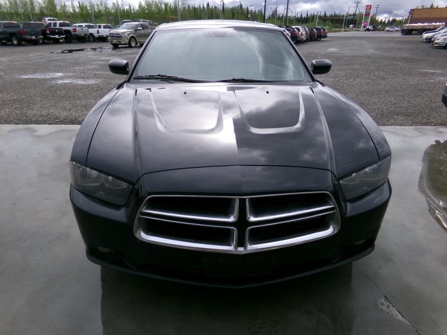 2014 Black Dodge Charger (2C3CDXJG7EH) , located at 2630 Philips Field Rd., Fairbanks, AK, 99709, (907) 458-0593, 64.848068, -147.780609 - Photo#1